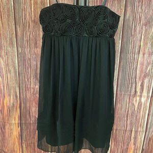 Black strapless dress by BCBG Paris in a size 4